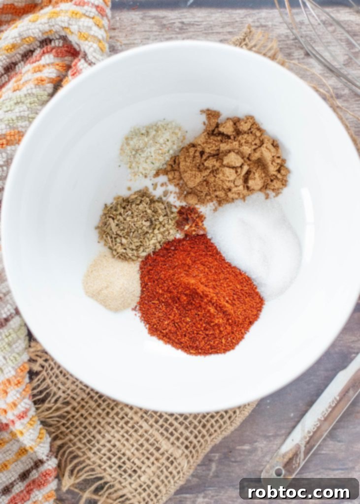 gluten-free-homemade-taco-seasoning-not-mixed-in-a-white-bowl