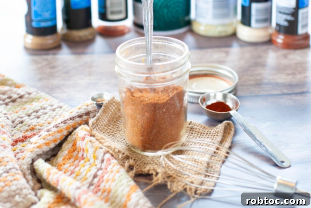 gluten-free-taco-seasoning-horizontal-picture-of-blend-with-seasonings-behind-it