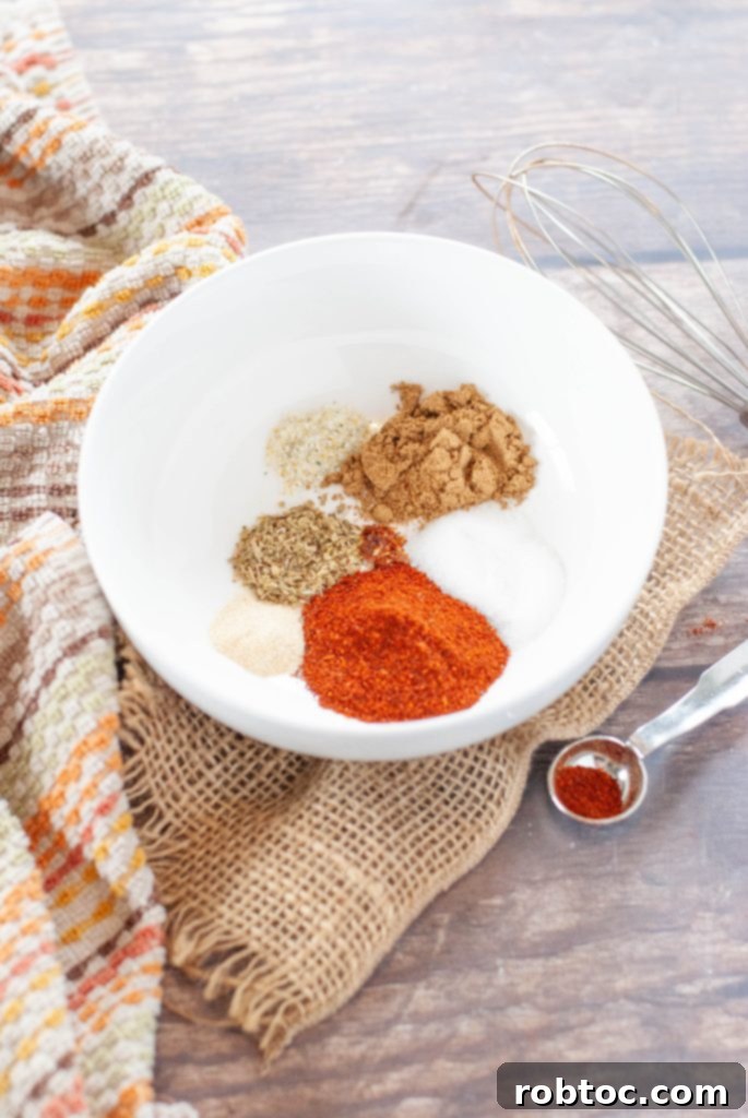 taco-spice-blend-in-bowl-before-stirring-farther-away