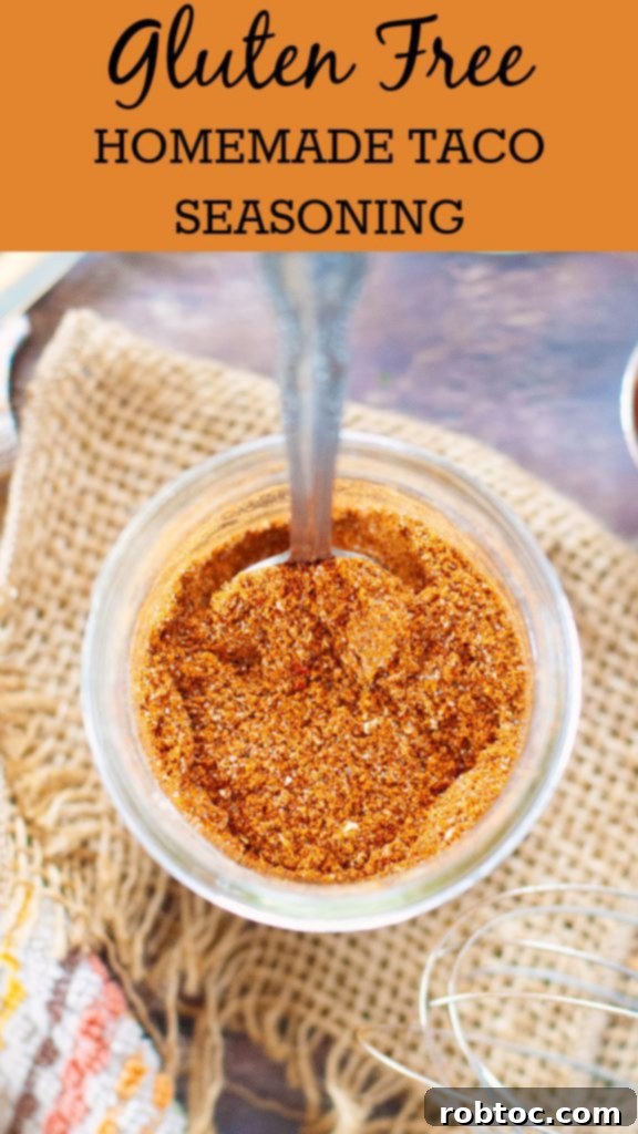 gluten-free-homemade-taco-seasoning-in-a-jar-with-a-spoon