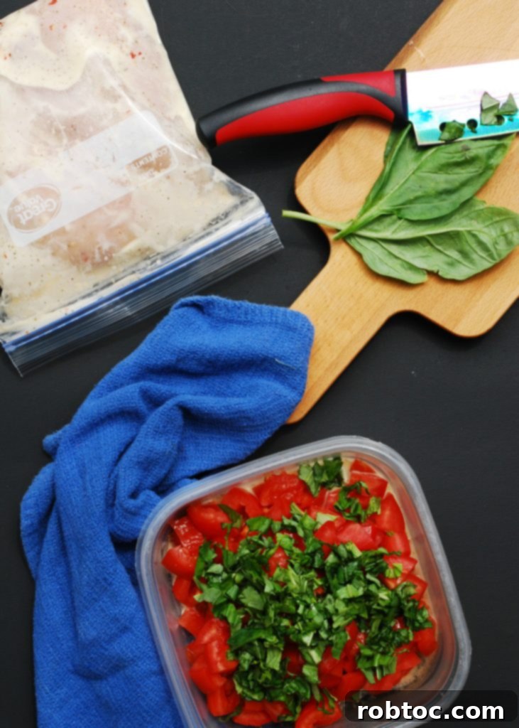 Close-up of Marinated Bruschetta Chicken and Fresh Basil